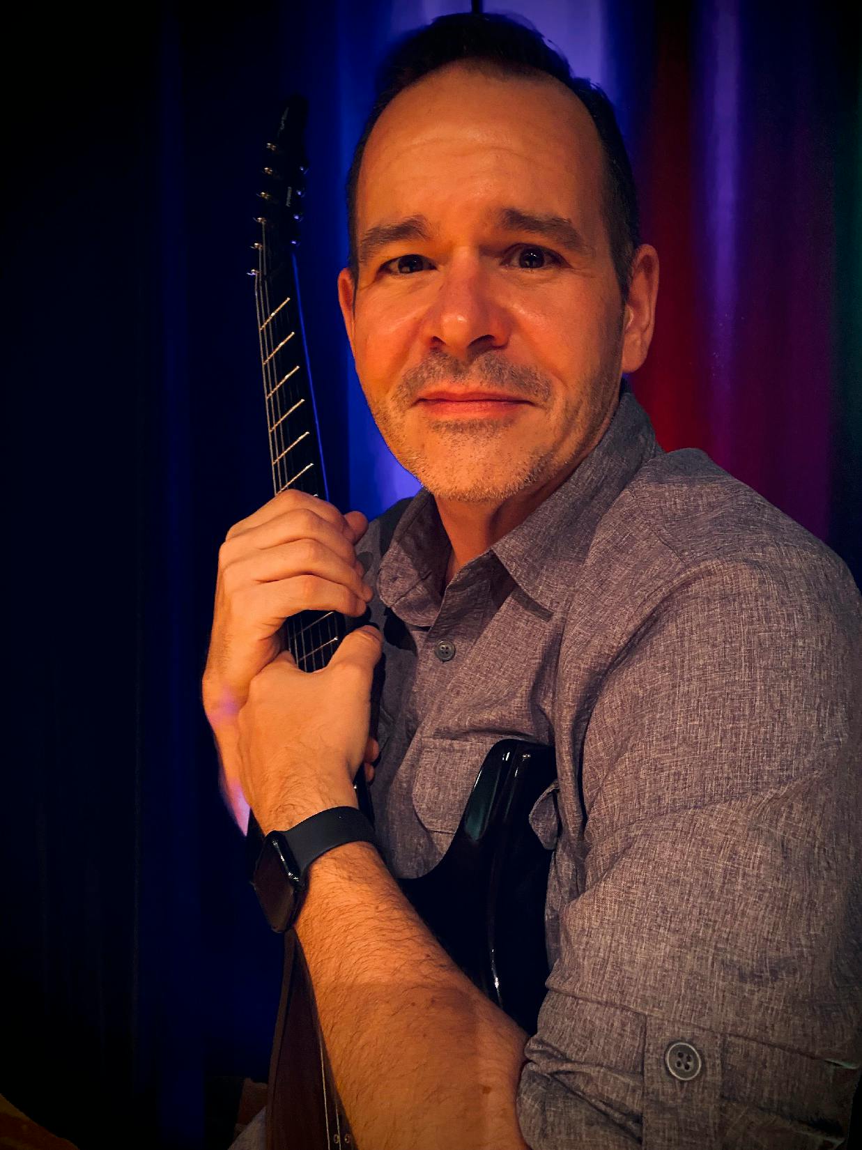 Photo of Aaron Walker, Castle Rock Music instructor of guitar, ukulele, bass